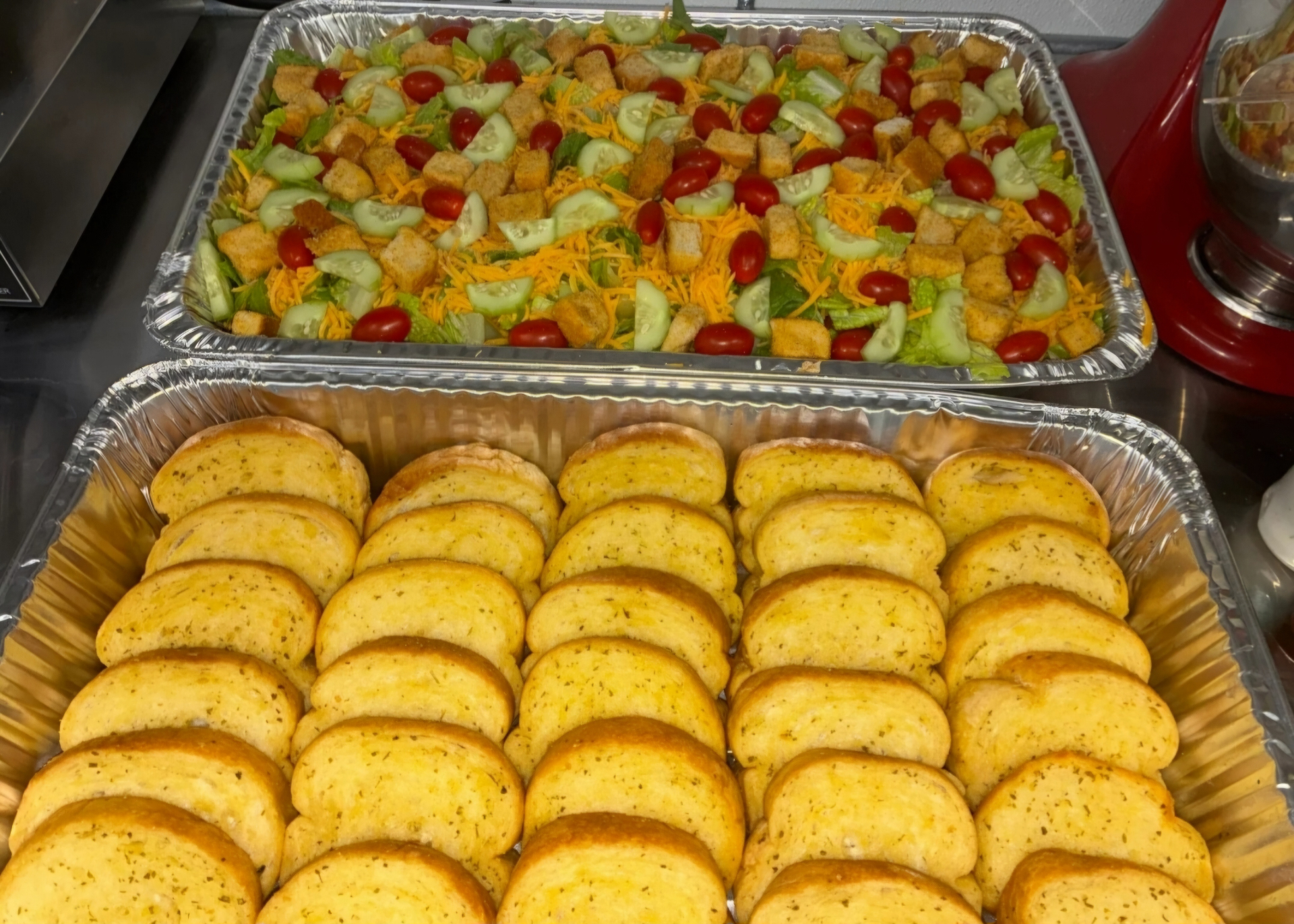 Fresh salad and garlic bread tray